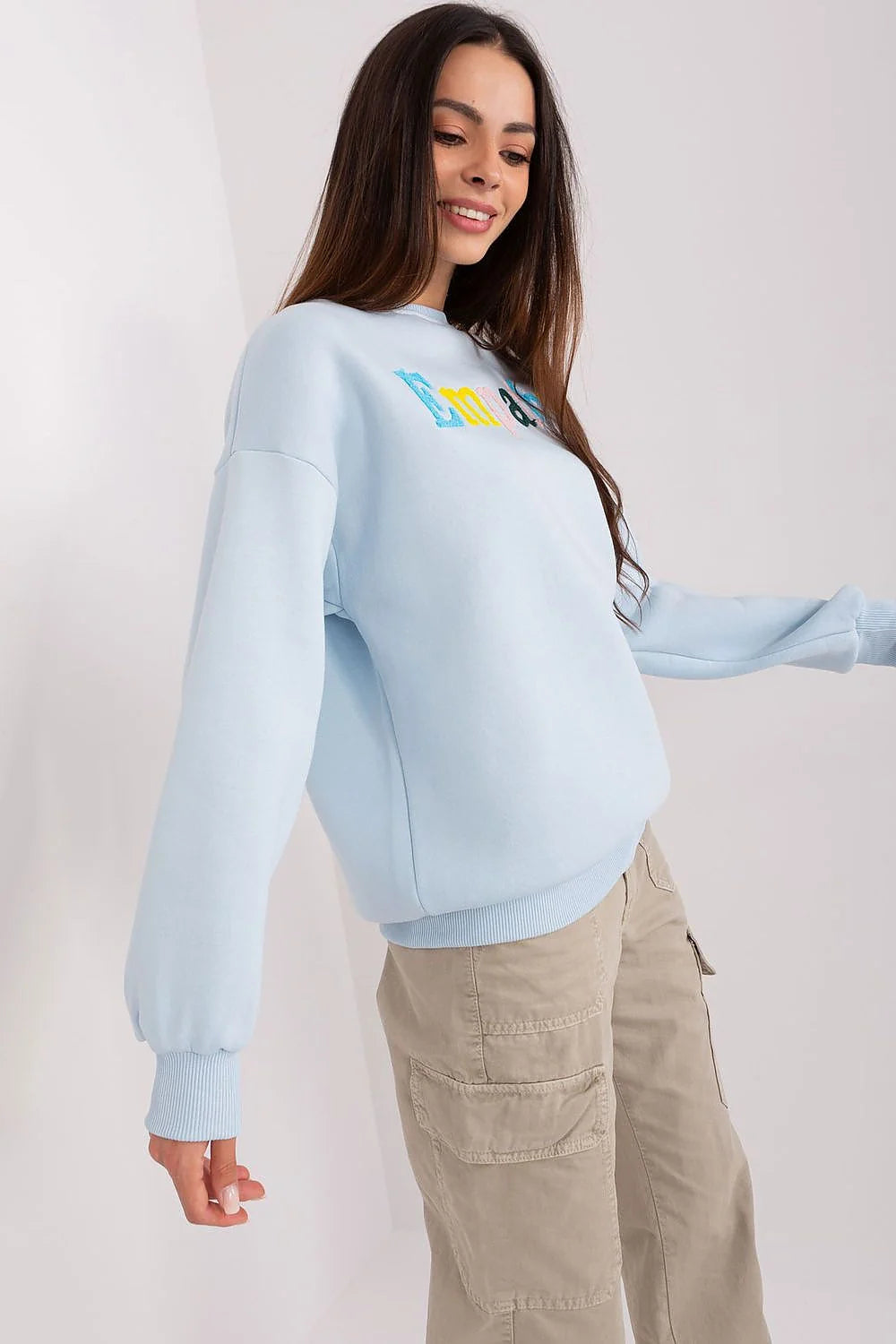 Sweatshirt femme couleur bleu clair design moderne Empathy brodé oversized manches longues coton polyester