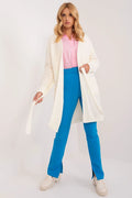 cardigan femme long ceinturé grosse maille ivoire oversize ouvert genoux manches longues côtelés poches plaquées ceinture amovible gaufrée