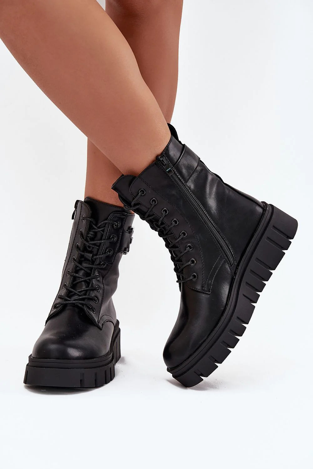 bottines femme combat plateforme cuir synthétique noir tige mollet laçage fermeture éclair latérale boucle métallique semelle crantée doublure fourrure