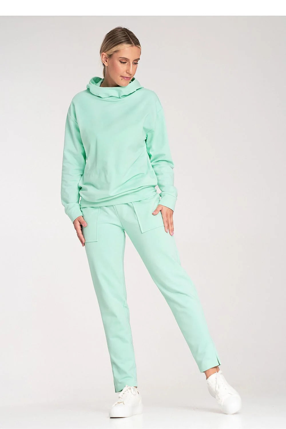 Pantalon survêtement femme en coton élasthanne vert menthe coupe slim ajustée poches latérales ceinture élastique occasion quotidienne décontractée mode été 2023