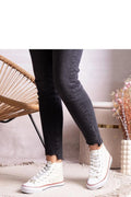 baskets montantes femme toile blanche semelle caoutchouc rouge lacets blancs œillets métalliques renfort cheville flexible antidérapante silhouette épurée casual rétro