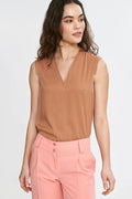Chemisier féminin sans manches en viscose couleur beige coupe régulière encolure V finitions élégantes pour tenues élégantes ou décontractées