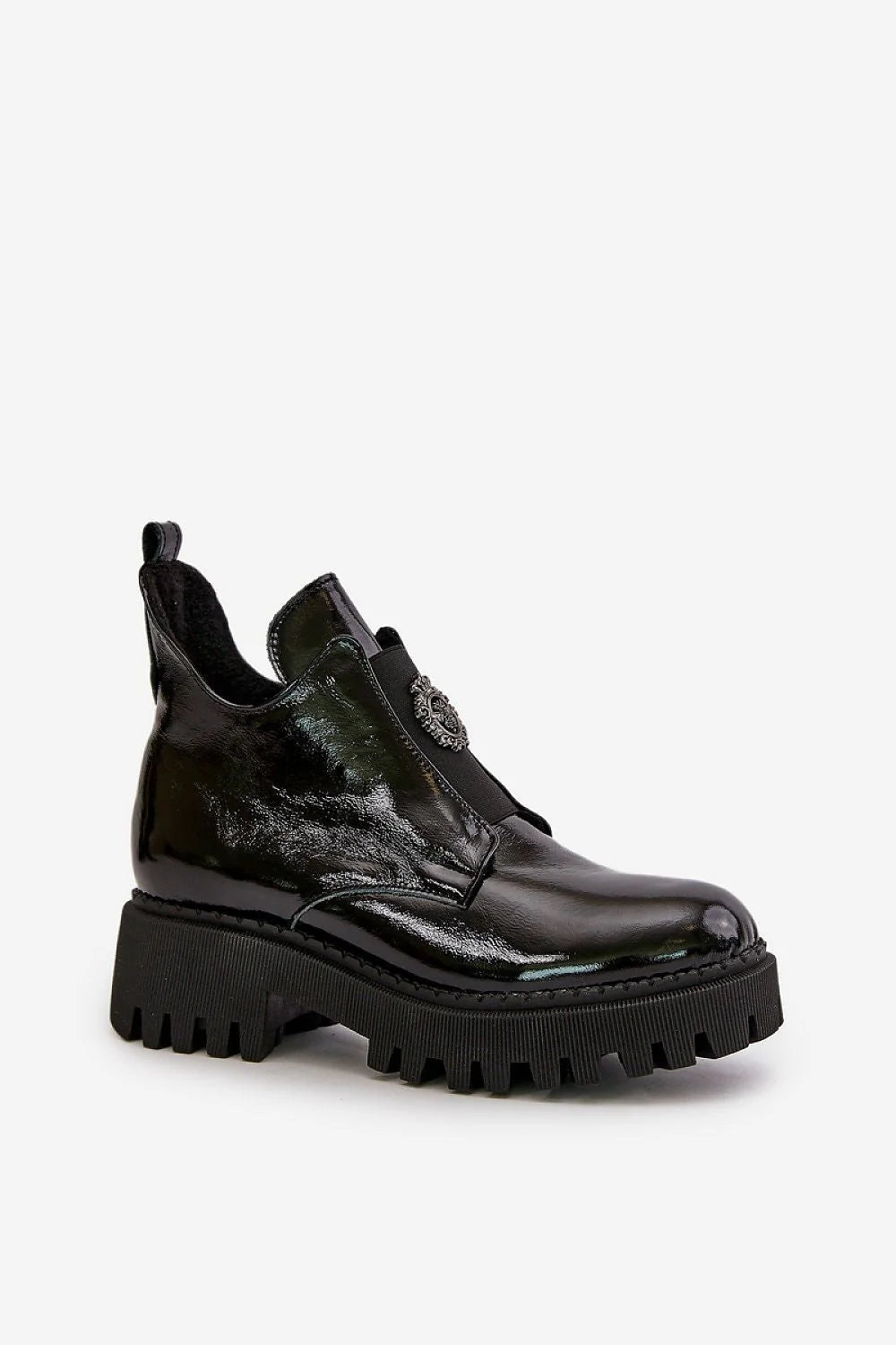 Bottines pour femmes en cuir verni noir talon massif plateforme crantée fermeture élastique métal blason semelle épaisse tige haute cheville