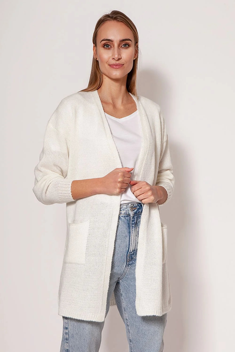 cardigan long femme gilet maille douce rose coupe droite minimaliste manches longues épaules tombantes poches plaquées bords côtelés mi cuisses