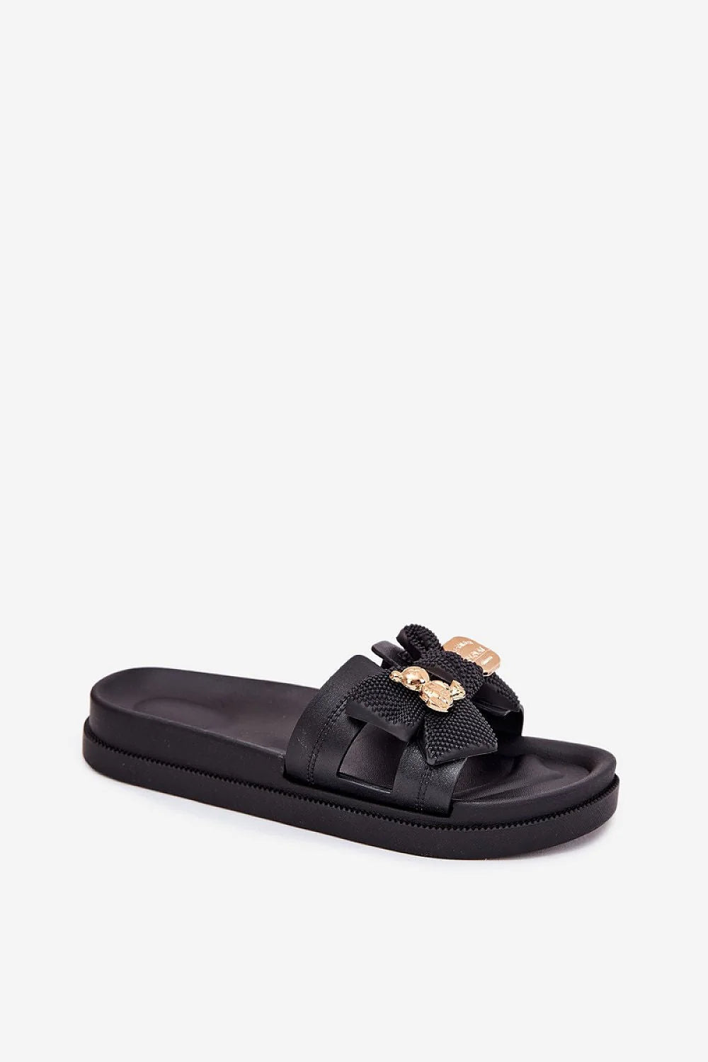 Sandales femmes design élégant contemporain cuir noir bride large nœud décoratif bijoux dorés semelle surélevée ouvertureorteils plage soiréété