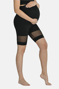 Short de maternité noir à taille haute coupe ajustée maille ventilation genou modeste confort élastique femmes enceintes