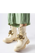 Bottes montantes audacieuses crème doré chaîne métallique cuir durable laces ajustables femmes mode tendance 2023