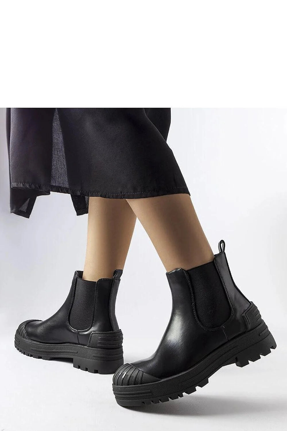 Bottes pour femmes design moderne robuste cuir noir tige haute protection caoutchouc semelle épaisse style Chelsea