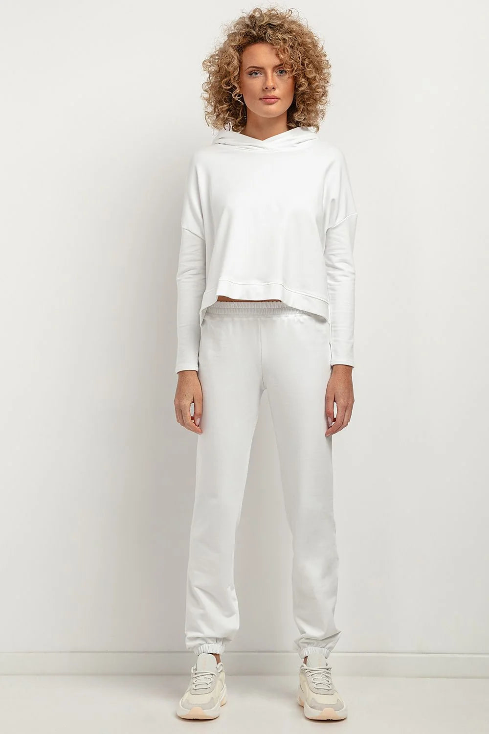 Pantalon survêtement Tessita pour femme, maille douce, coupe ample, élastique taille et jambes, idéal pour détente athleisure
