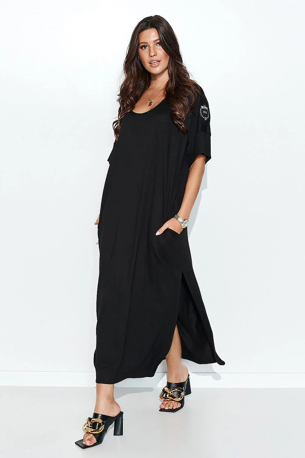 Robe longue coton noire streetwear ample manches courtes poches latérales élégance mode féminine casual