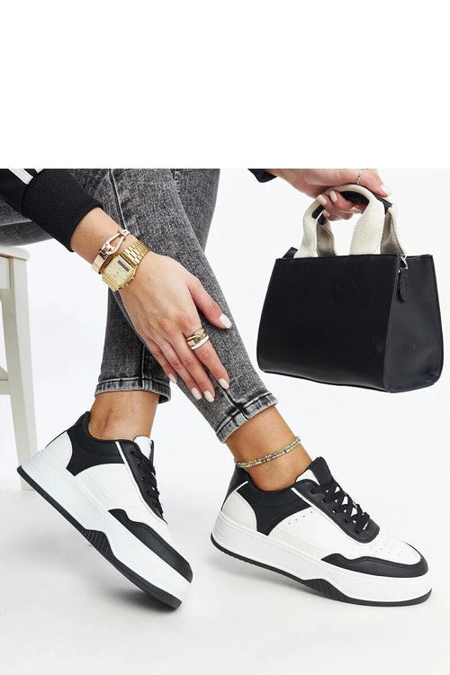 Baskets pour femmes modernes design épuré couleur blanc et noir tige en faux cuir lacets noirs semelle épaisse antidérapante baskets urban style casual