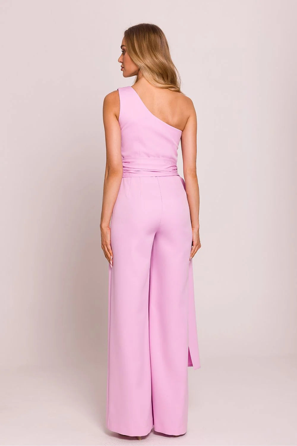 Combinaison élégante asymétrique rose pâle épaule unique ceinture intégrée jambes larges longueur sol matériau lisse femme