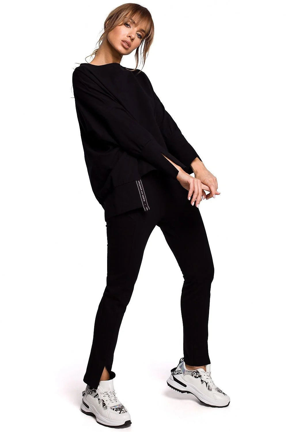Sweatshirt ample coton noir moderne confortable manches longues fentes poignets pour femme décontractée élégante