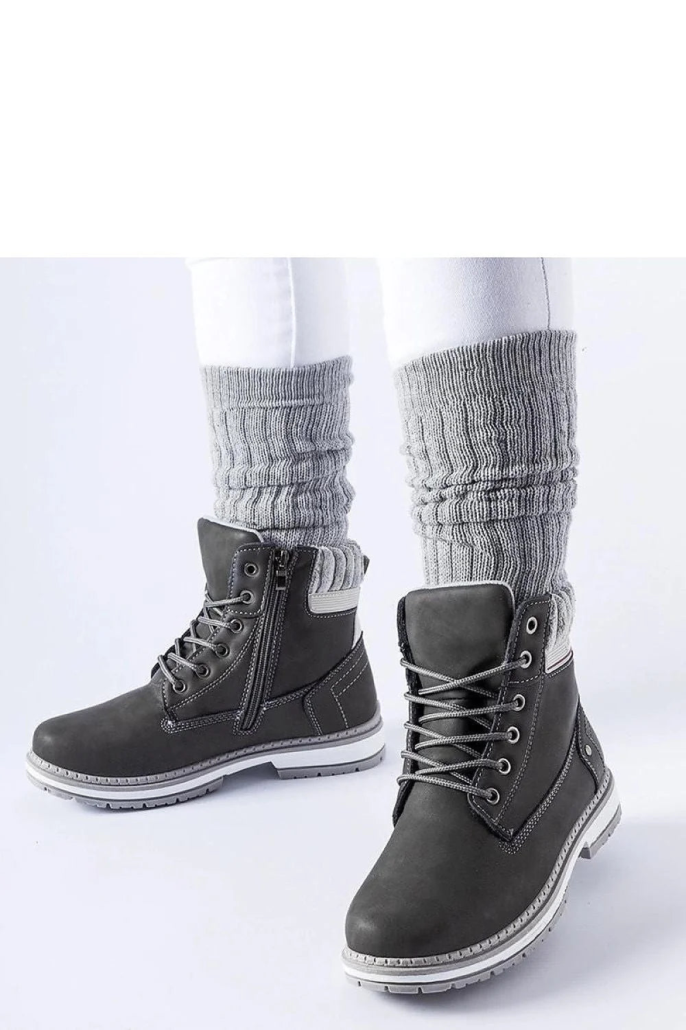 Bottes Solea femmes style moderne tige haute cuir noir doublure tricot fermeture éclair lacing métal semelle blanche crantée