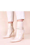 bottines beige ivoire cuir synthétique finition brillante talon aiguille doré bout pointu tige mi cheville bride boucle fermeture éclair latérale