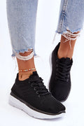 Chaussures de sport modernes pour femmes en tissu maille noire et semelle blanche, confortable, style athlétique, idéales pour la ville et les activités sportives