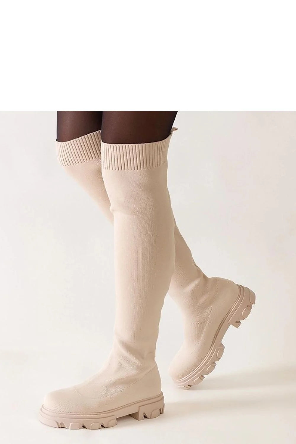 Bottes cuissardes beige maille élégantes modernes confortables semelle épaisse ajustées mode chic femmes