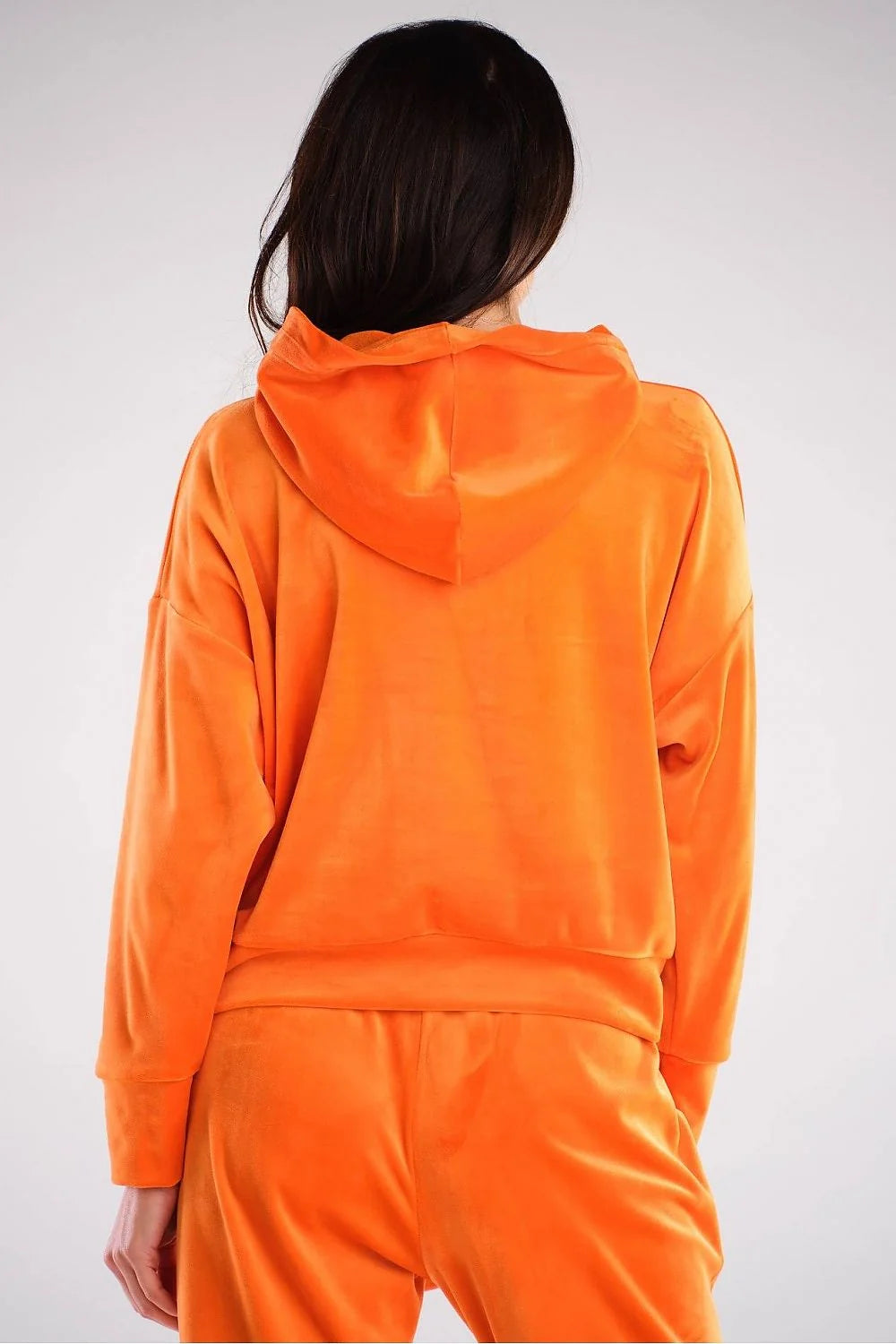 Sweatshirt femme velours rose vif style décontracté chic confortable coupe ample capuche poches pratiques