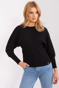 Pull femme noir côtelé coupe ample manches chauve-souris épaules tombantes encolure ronde finitions soignées occasion quotidienne semi-formelle