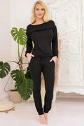 pyjama femme deux pièces noir jersey doux viscose élasthanne manches longues encolure bateau volant discret pantalon cordon poches