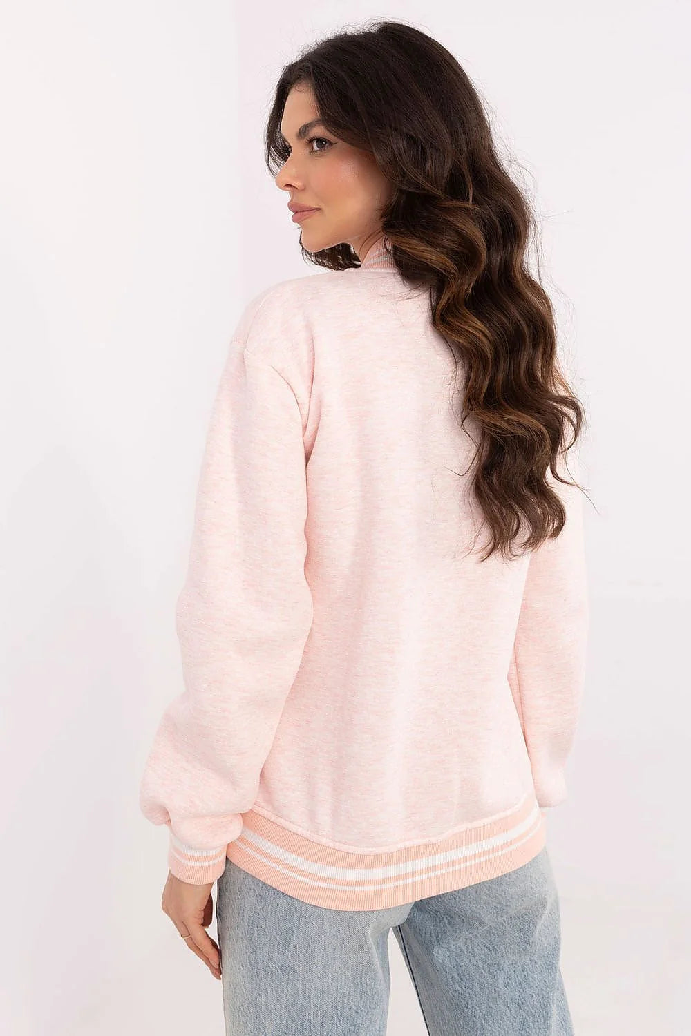 Veste bomber pour femme style universitaire sportif couleur rose pâle manches longues col montant fermeture boutons pression
