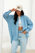 Chemise manche longue Roco Fashion style casual oversize rayures fines bleu clair coton 100% coupe asymétrique poignets boutonnés femme