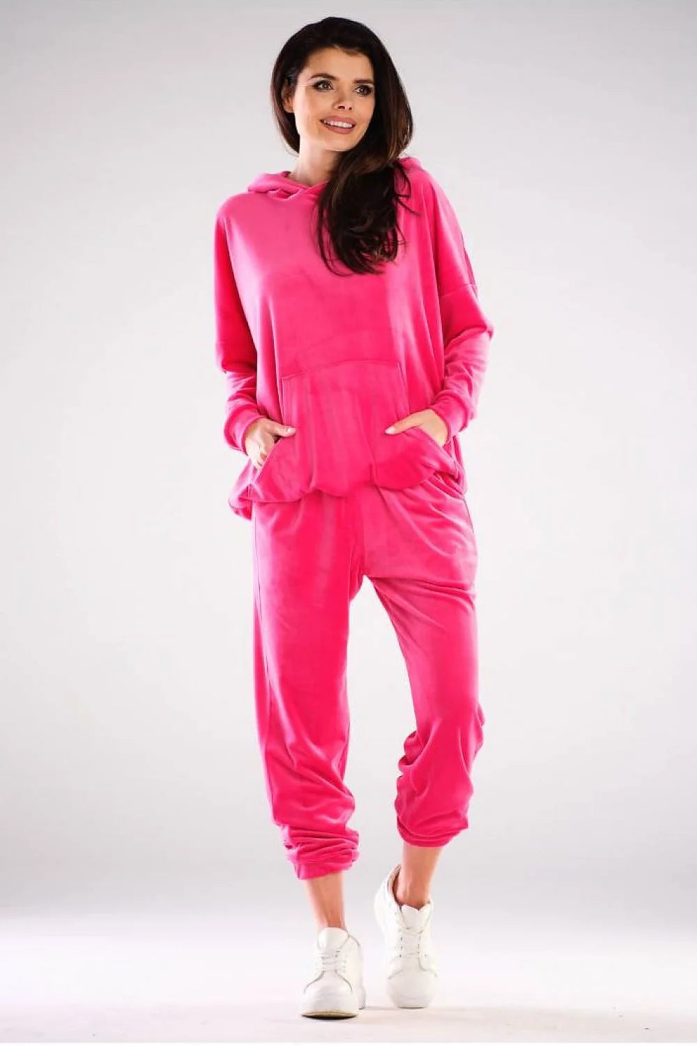 Sweatshirt velours rose vif style urbain ample avec capuche et poche kangourou pour femmes modernes