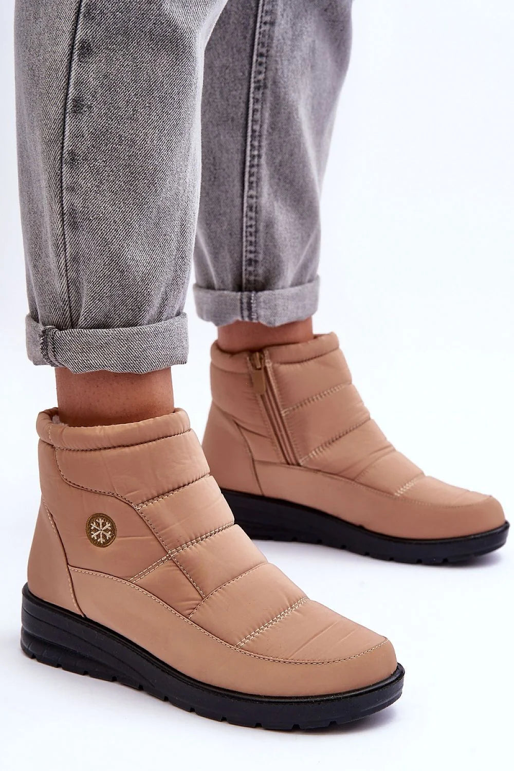 Bottes de neige Step in style femmes design moderne fonctionnel matelassé beige clair semelle caoutchouc noir