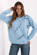 sweatshirt femme oversize bleu ciel col rond manches longues épaules tombantes molletonnée coton polyester broderies lettrées graphique casual relaxed polyvalent
