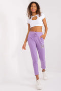 Ensemble mode femme crop top moderne découpe ovale coton polyester joggers lilas pastel ceinture élastique poches broderie papillon