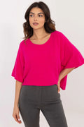 Pull oversize pour femme manches courtes couleur fuchsia coupe boxy matériau doux style moderne