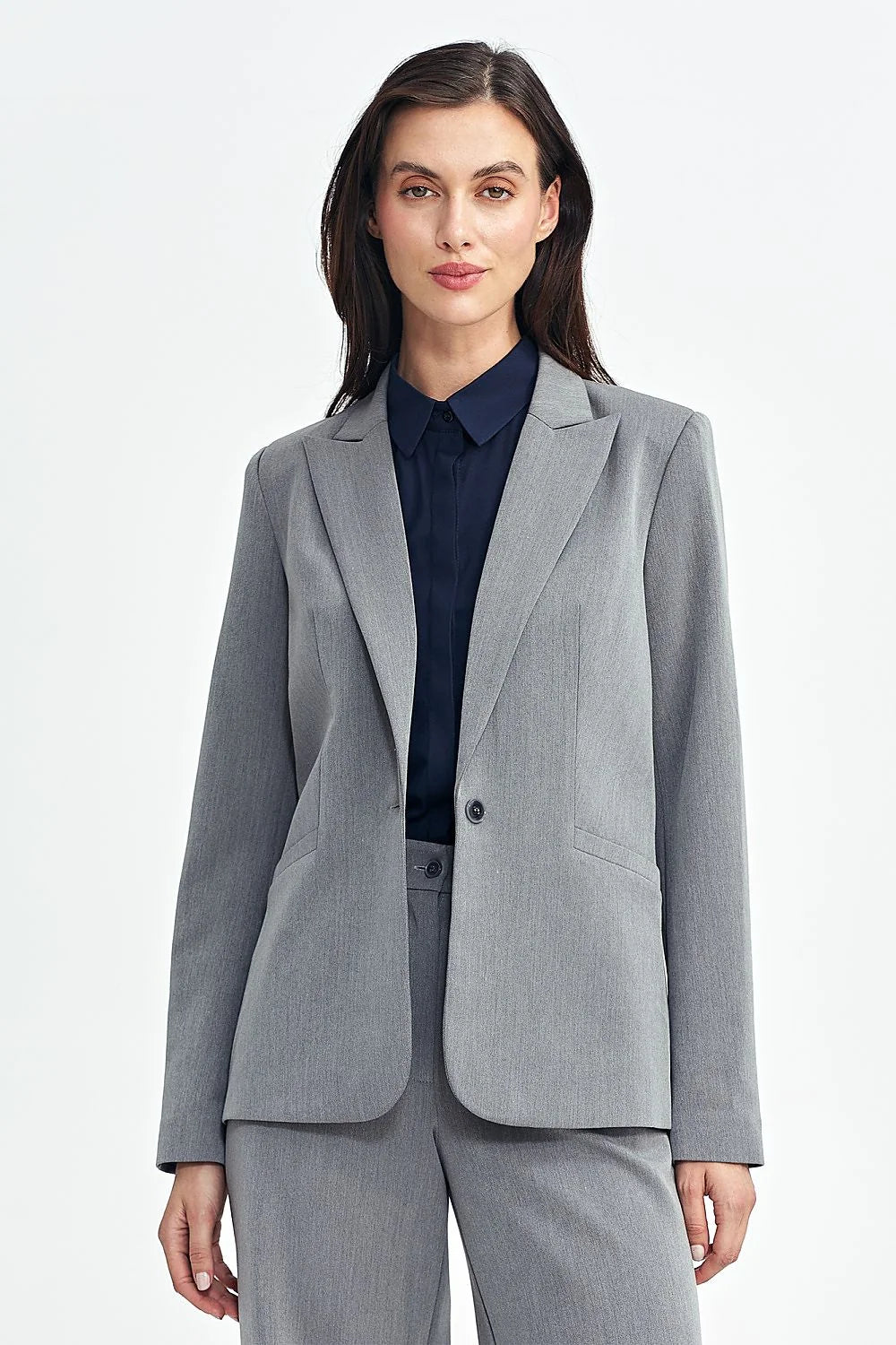 Blazer femme élégant gris clair taille ajustée style professionnel col à revers manches longues poches revers femmes