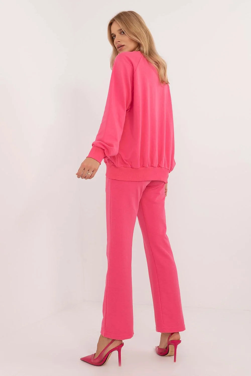 Ensemble sportswear pour femmes, sweatshirt et pantalon, rose vif, coupe ample, confortable, style moderne, manches longues, poches pratiques, matériau doux, occasion quotidienne, vêtement tendance, durabilité
