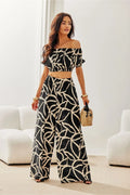 Tenue féminine Roco Fashion deux pièces pantalon haut jambes larges motif animalier couleurs noires beige matières fluides occasion été