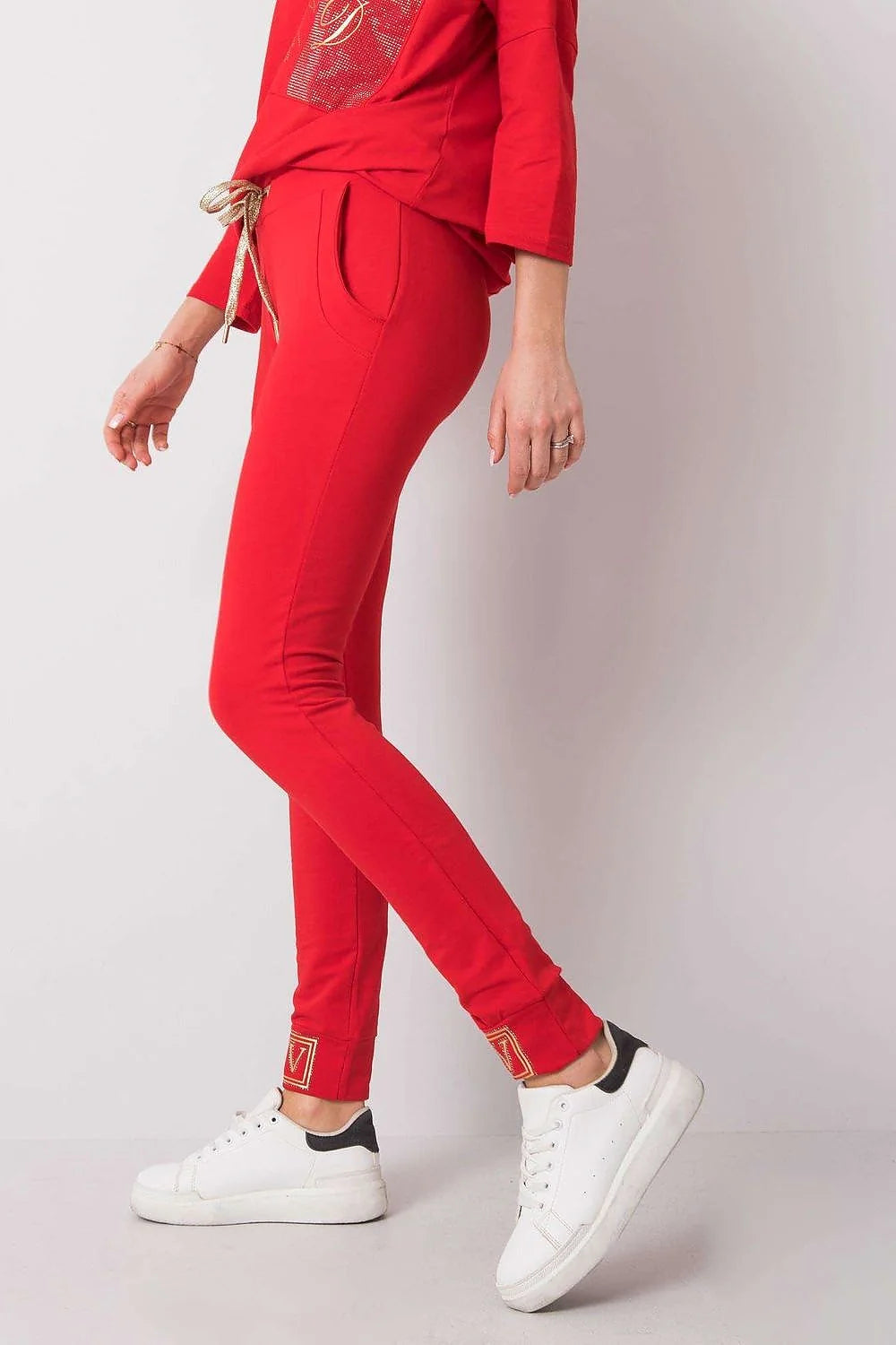 pantalon survêtement femme slim taillebasse fuselé chevilles resserrées rose poudré jersey stretch coton élasthanne poches latérales bande brodée