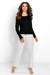 Pyjama viscose élasthanne noir haut ajuste manches longues pantalon blanc motifs petits pois coupe ample ceinture élastique cordon
