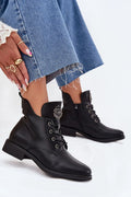 bottines noir simili cuir doublure fourrure synthétique talon bas lacées zippées œillets métalliques semelle antidérapante bout arrondi médaillon décoratif urbain
