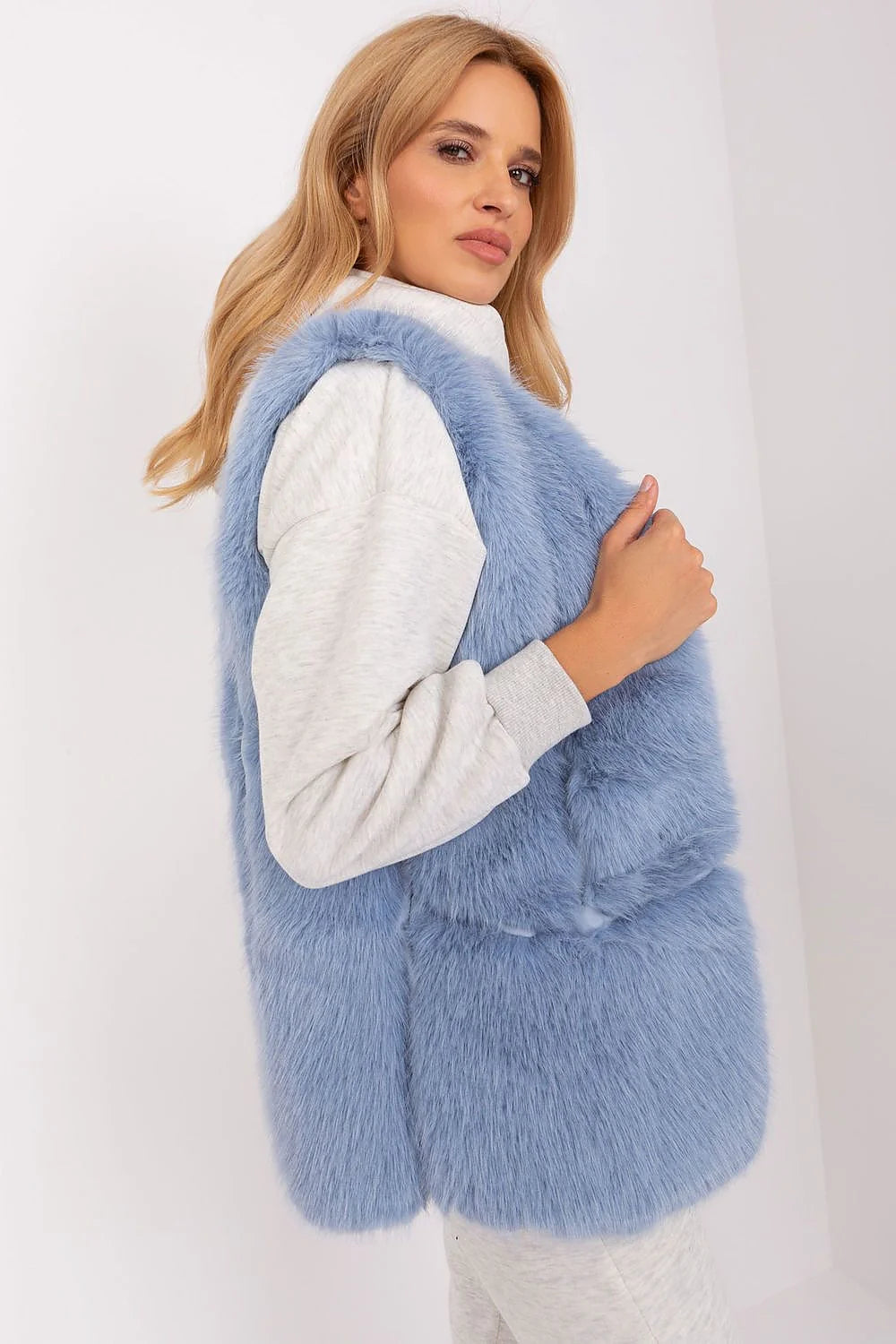 Veste sans manches en fausse fourrure moderne élégante bleu pastel longue coupe droite pour femme