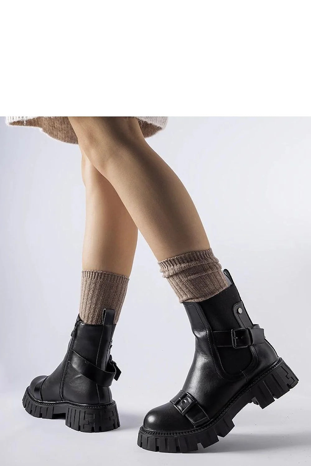 Bottines noires design moderne cuir talons confortables semelle épaisse cheville ajustable femme style robuste