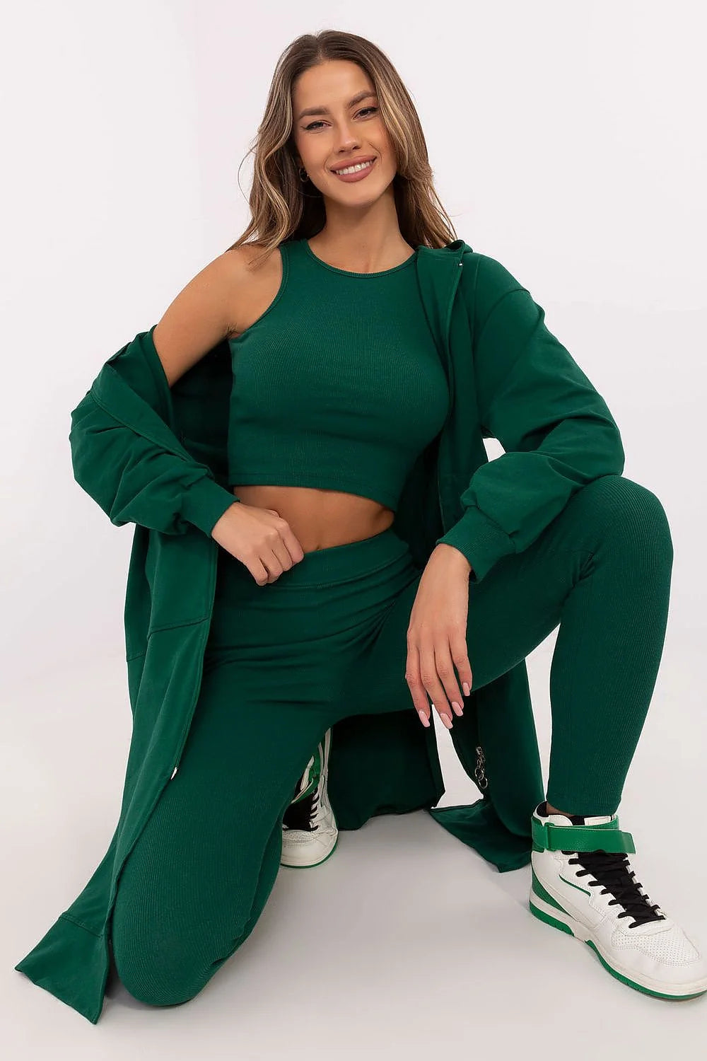 Ensemble coordonné femme modern style athlétique vert foncé veste longue capuche haut court leggings élasthanne coton fermeture éclair poches