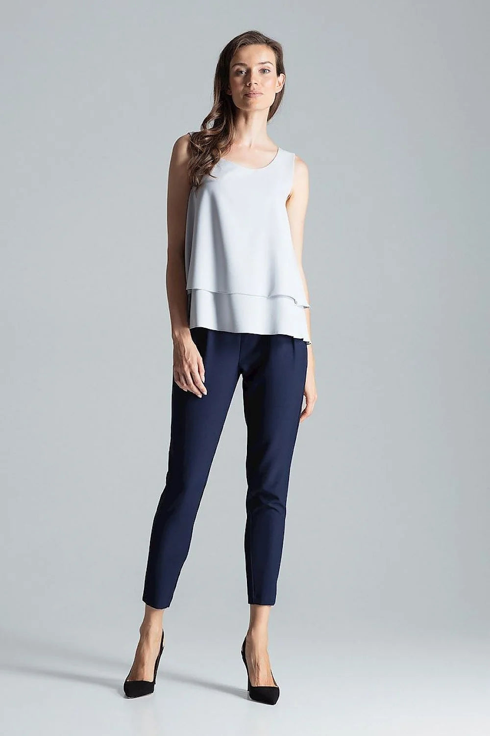 Haut élégant sans manches en polyester bleu marine coupe fluide superposition tissu femme moderne