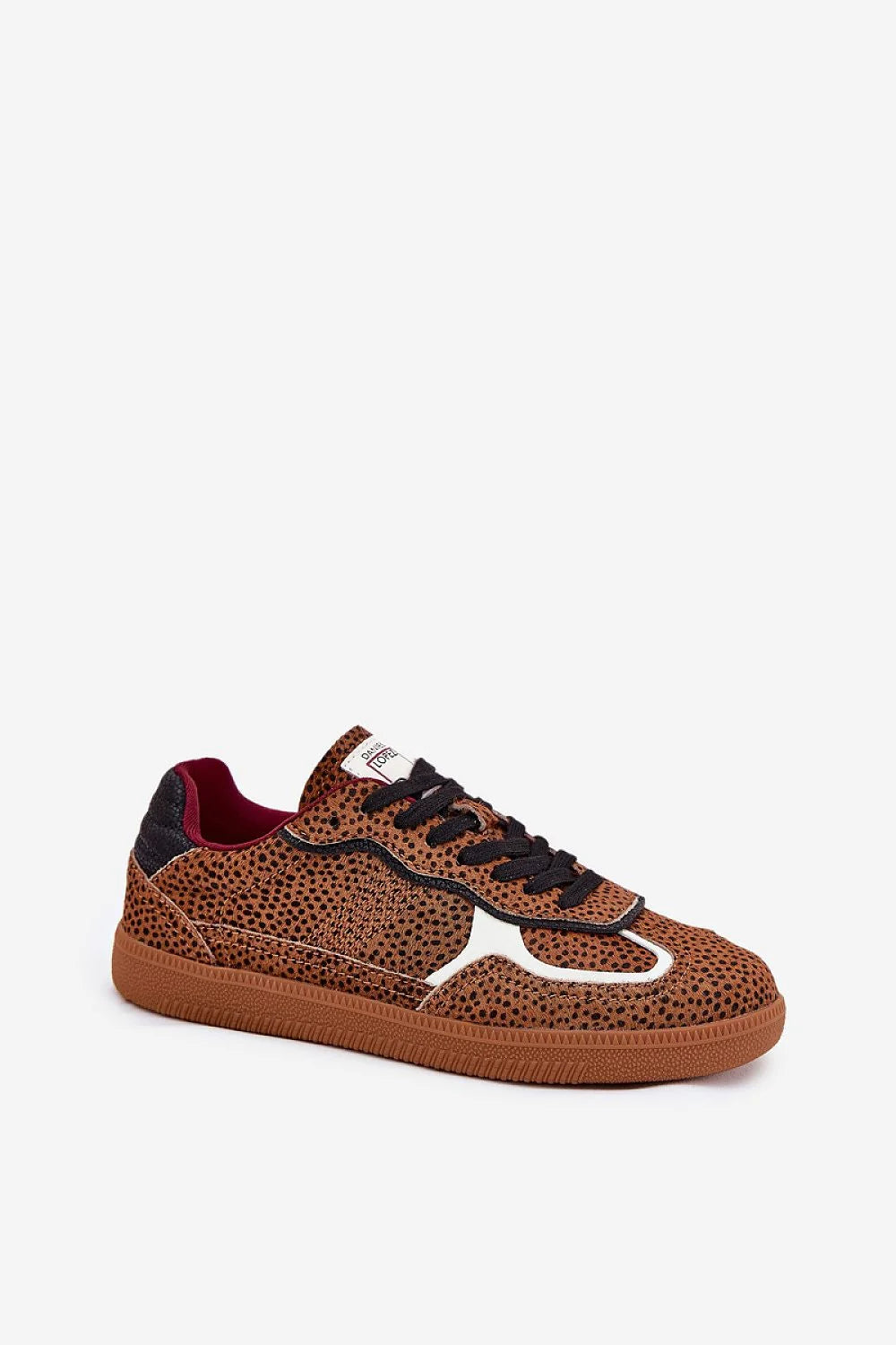 Chaussures sport femme design audacieux cuir texturé motif animal Brun Noir contrastes Blancs laces robustes maintien personnalisé semelle caoutchouc