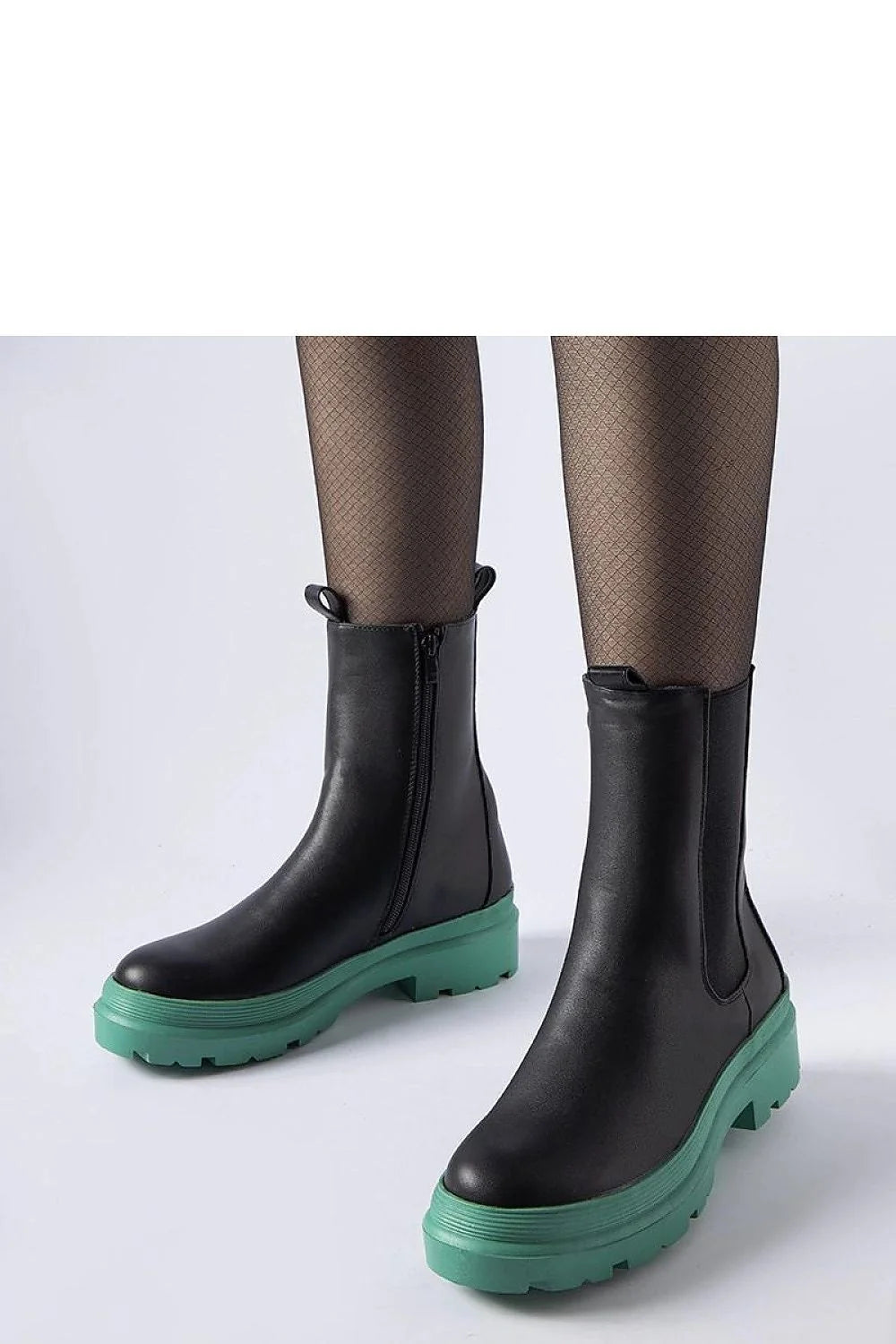 bottes montantes cuir noir semelle verte caoutchouc plateforme crantée bout rond fermeture éclair intérieure talon épais antidérapante languette urbain confortable