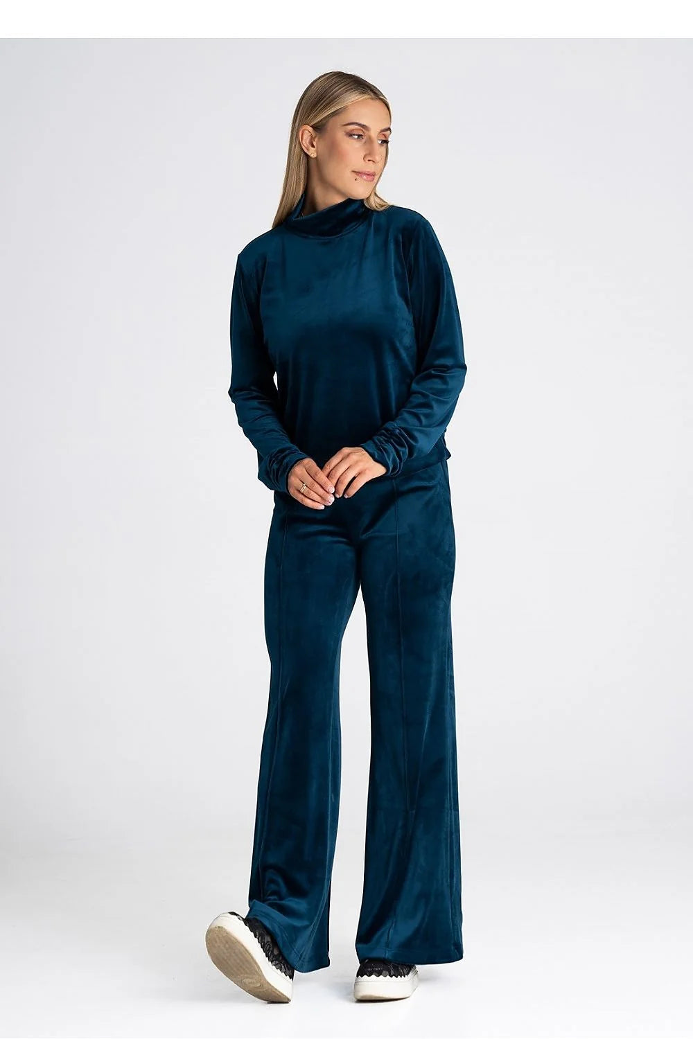 pantalon survêtement velours bleu pétrole taille haute ajustable coupe évasée jambe large doux brillant minimaliste sophistiqué confortable stretch finition discrète