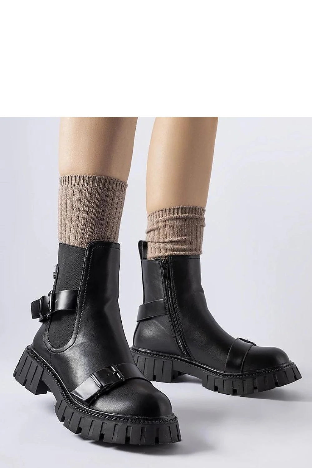 Bottines noires design moderne cuir talons confortables semelle épaisse cheville ajustable femme style robuste