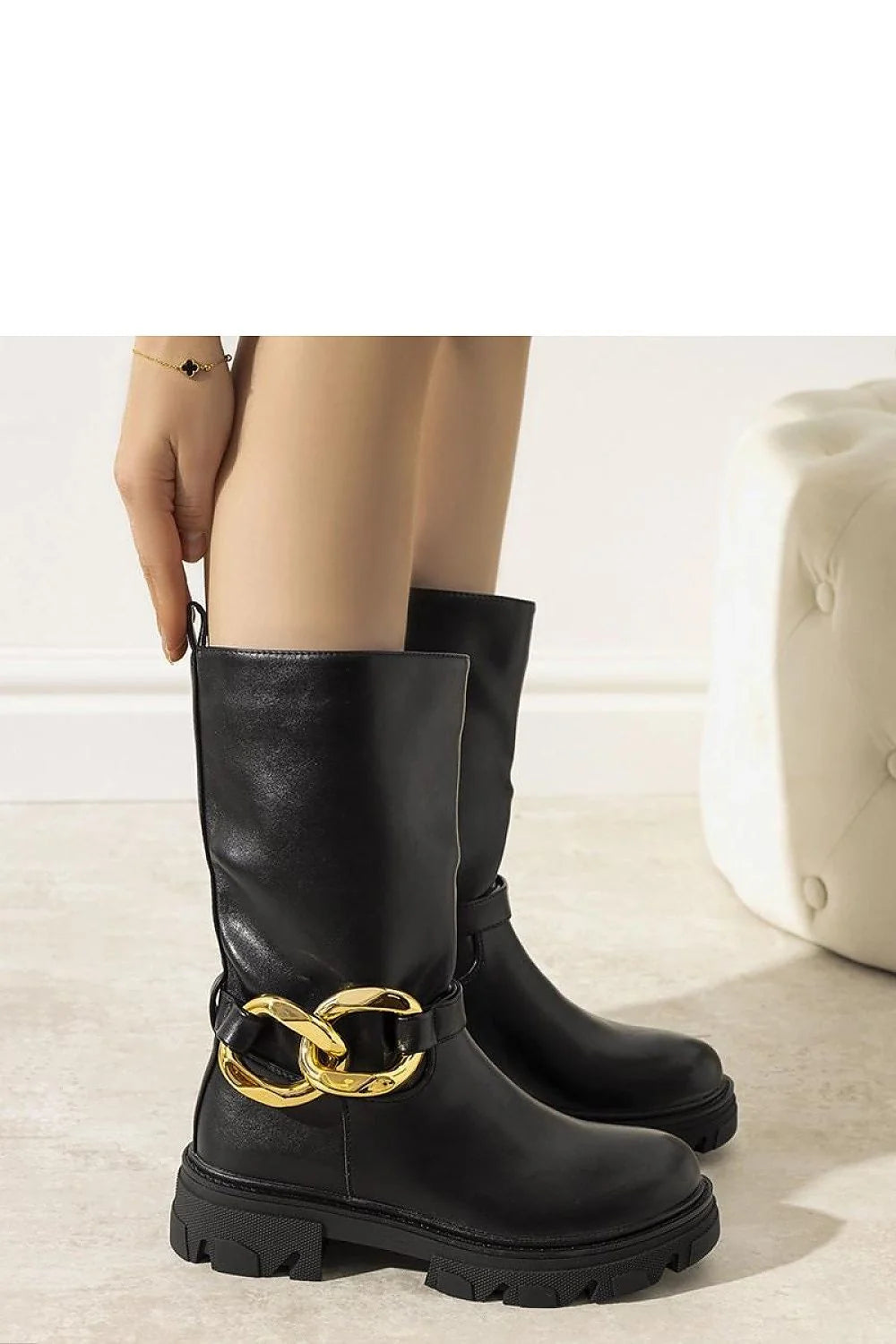 Bottes mi-hautes femmes cuir noir doré anneau métallique design moderne tendance automne hiver semelle épaisse fourrure intérieure