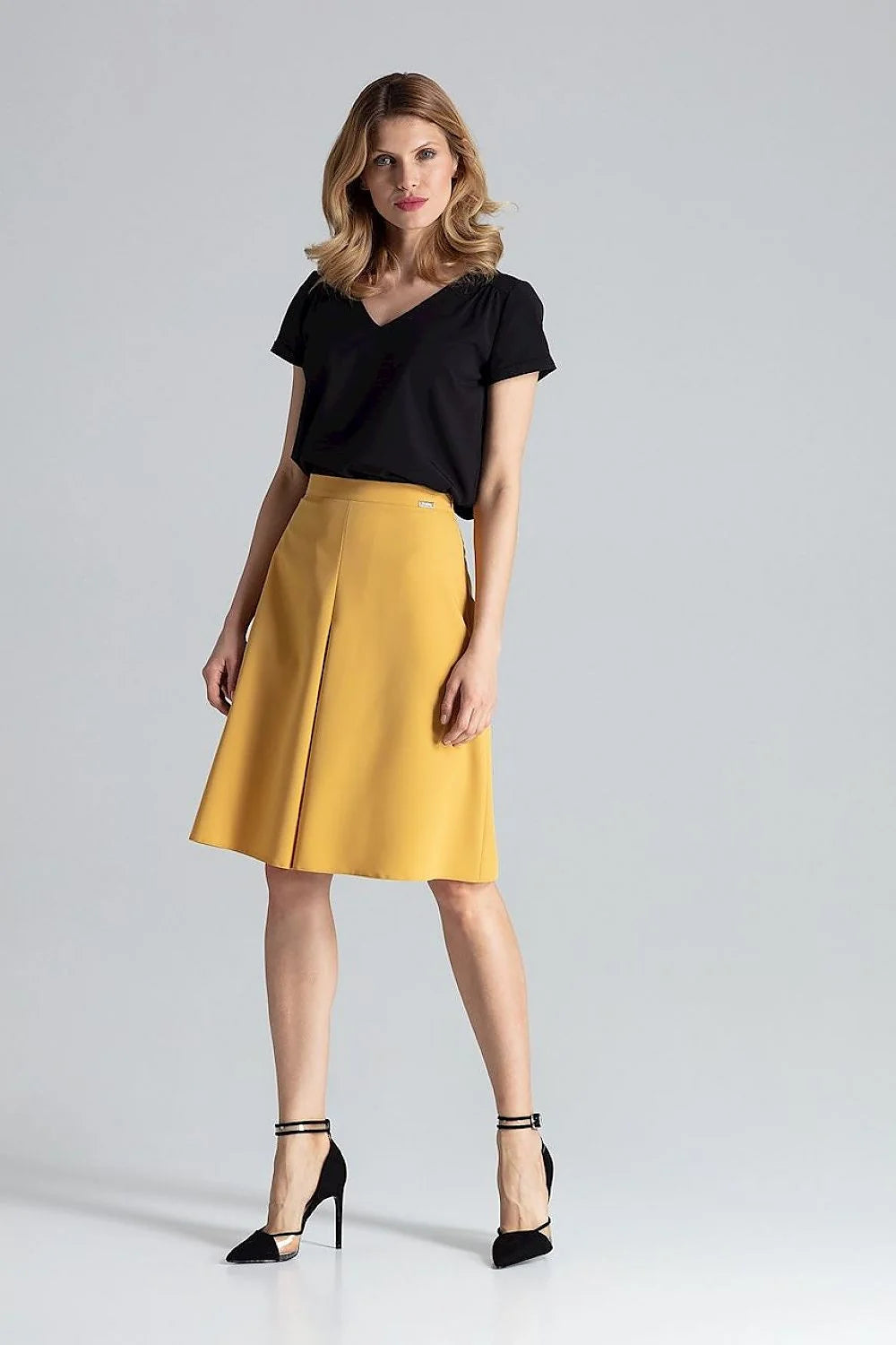 jupe trapèze midi taille haute ajustable mi genou évasée plis contrastés jaune moutarde tissu structuré tombé net élégant contemporain professionnel
