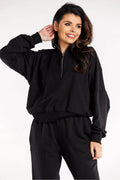 ensemble sweatshirt pantalon femme noir oversize col montant demi zip molleton doux coupe ample manches tombantes taille elastique poignets cotes
