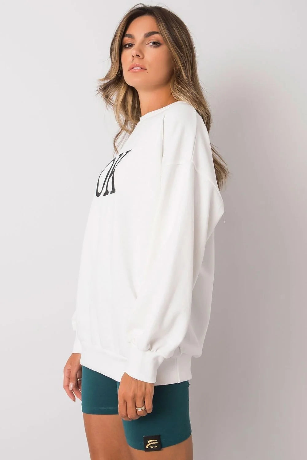 sweatshirt femme oversize noir col rond manches longues lettrage blanc OK molleton épais confortable ample poignets élastiques