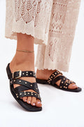 Sandales femmes style moderne audacieux cuir noir clous dorés brides croisées talon plat confortable été